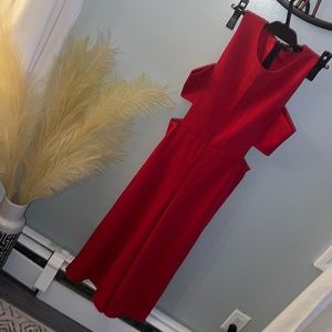 Misguided red cut out cullotte jumpsuit. Worn once size 8.